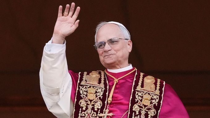 Cardinal Robert Prevost appears on the central loggia of St. Peter's Basilica after being chosen the 267th pontiff of the Roman Catholic Church, choosing the name of Pope