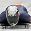 Canada's Neilson speeds down the track during a men's skeleton training session at the Sanki sliding center in Rosa Khutor, a venue for the Sochi 2014 Winter Olympics, near Sochi