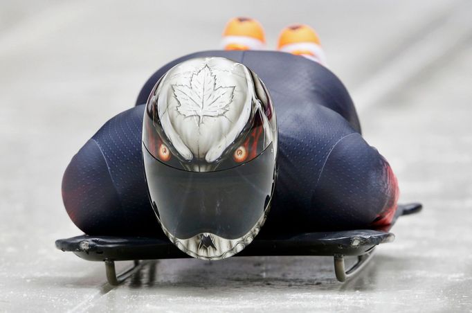 Canada's Eric Neilson speeds down the track during a men's skeleton training session at the Sanki sliding center in Rosa Khutor, a venue for the Sochi 2014 Winter Olympic