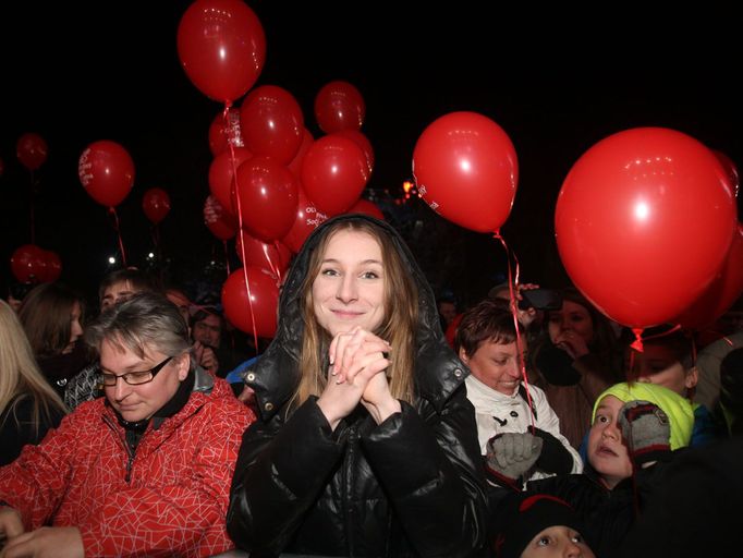 Letná, přivítání olympioniků ze Soči: fanynka