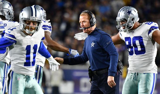 Jan 12, 2019; Los Angeles, CA, USA; Dallas Cowboys head coach Jason Garrett and tight end Rico Gathers (80) celebrate with teammates after a touchdown in the first quarte