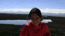 Marathon runner Gladys Tejeda, the first Peruvian athlete who qualified for the 2012 London Olympic Games, takes a rest during her training in the Andean province of Junin May 14, 2012. A private company will take Gladys' mother Marcelina Pucuhuaranga, 69, to London as part of the "Thank you Mom" program. For Pucuhuaranga, who received her first passport, it will be the first time travelling out of Peru. The program will take about 120 mothers of different athletes around the world to attend the games. Tejeda, the youngest of nine children, returned to her hometown to visit her mother and to focus on training where she will run more than 20 km every day in the highlands (over 4,105 meters above sea level). Picture taken May 14, 2012. REUTERS/Pilar Olivares (PERU - Tags: SPORT ATHLETICS OLYMPICS) Published: Kvě. 17, 2012, 7:10 odp.