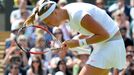 Petra Kvitová v zápase proti Jekatěrině Makarovové na Wimbledonu 2013