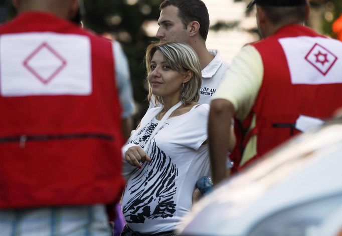 An Israeli survivor is transported to an ambulance as she leaves a hospital in the city of Burgas, some 400km (249 miles) east of Sofia July 19, 2012, en route to Israel. A suicide bomber committed the attack that killed eight people in a bus transporting Israeli tourists at a Bulgarian airport, the country's interior minister said on Thursday, and Israel accused Iranian-backed Hezbollah militants of responsibility. REUTERS/Stoyan Nenov (BULGARIA - Tags: CRIME LAW TRANSPORT)