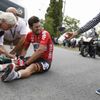 Lotto-Belisol team rider Henderson of New Zealand gets assistance after crashing during the 163.5 km fourth stage of the Tour de France cycling race from Le Touquet-Paris-Plage to Lille