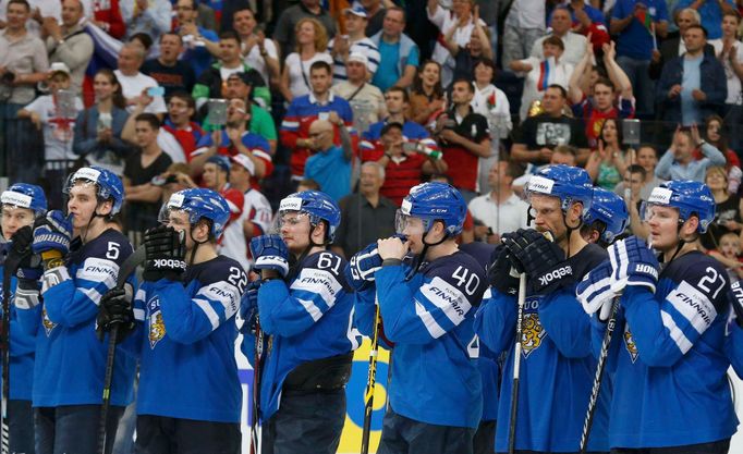 Finland's players react after losing their men's ice hockey World Championship final game against Russia at Minsk Arena in Minsk May 25, 2014. REUTERS/Vasily Fedosenko (B