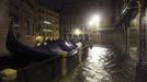 Gondolas are seen near a flooded St Mark's Square at night during a period of seasonal high water in Venice November 1, 2012. The water level in the canal city rose to 140 cm (55 inches) above normal, according to the monitoring institute. REUTERS/Manuel Silvestri (ITALY - Tags: ENVIRONMENT SOCIETY TRAVEL DISASTER TRANSPORT) Published: Lis. 1, 2012, 8:15 dop.