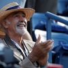 FILE PHOTO: Actor Connery awaits the start of the U.S. Open men's final match between Serbia's Djokovic and Britain's Murray in New York