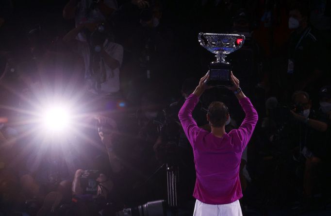 Tennis - Australian Open - Men's Singles Final - Melbourne Park, Melbourne, Australia - January 31, 2022 Spain's Rafael Nadal celebrates winning the men's singles final w