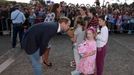 Britain's Prince William and his wife Catherine, the Duchess of Cambridge, speak with a group of young children during a tour to Echo Point in the Blue Mountains town of