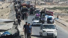 Displaced Palestinians, fleeing northern Gaza move southward, in the central Gaza Strip