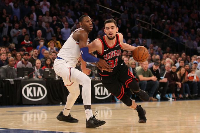 Oct 28, 2019; New York, NY, USA; Chicago Bulls shooting guard Tomáš Satoranský (31) drives around New York Knicks small forward RJ Barrett (9) during the fourth quarter a