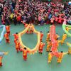Students with dragon dance props form &quot;2015&quot; to welcome the upcoming New Year at an art school in Hefei