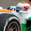 Force India Formula One driver di Resta takes curve during q