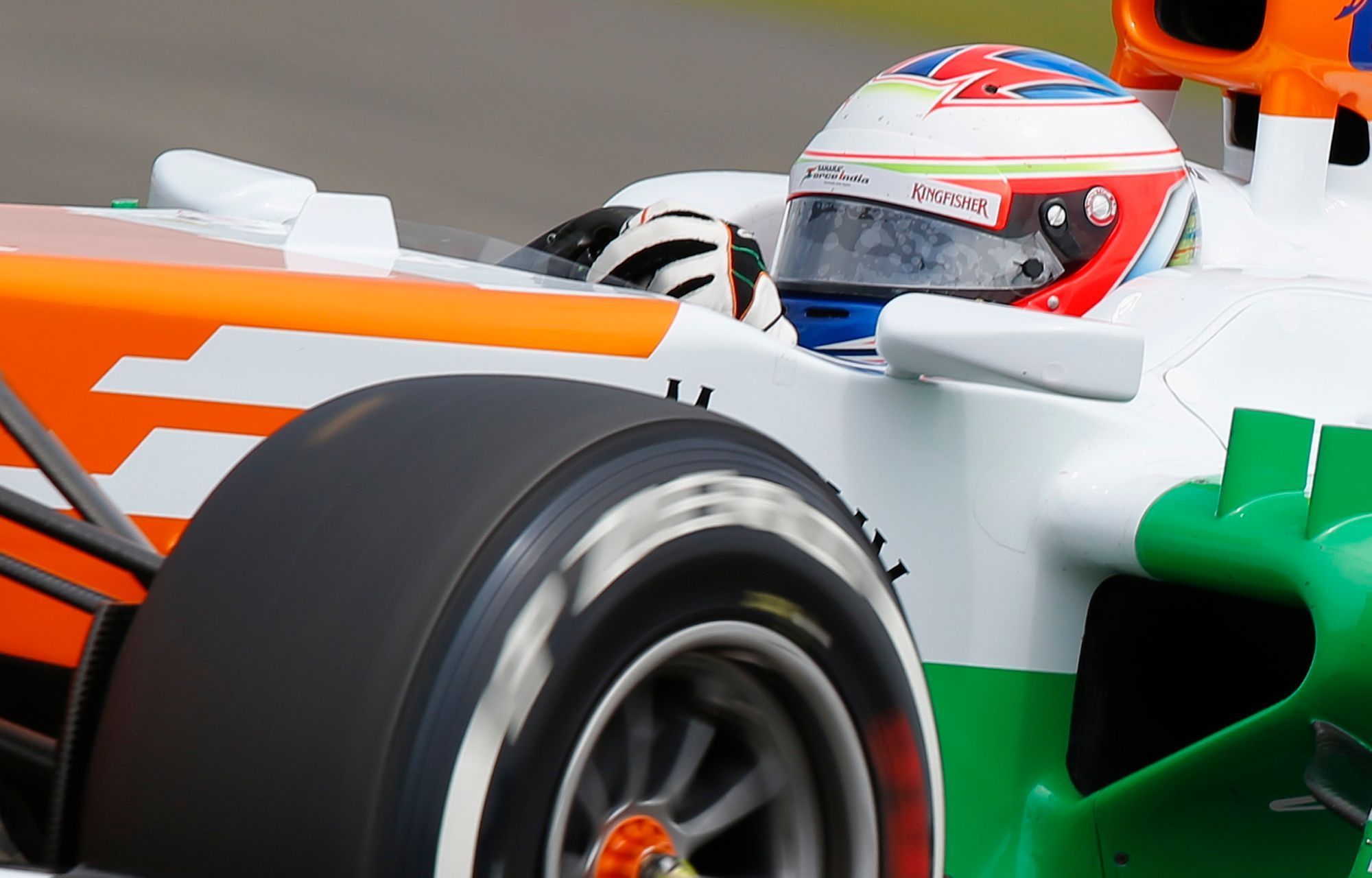 Force India Formula One driver di Resta takes curve during q