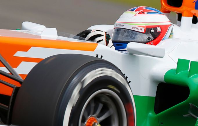 Force India Formula One driver Paul di Resta of Britain takes a curve during the qualifying session of the British Grand Prix at the Silverstone Race circuit, central Eng