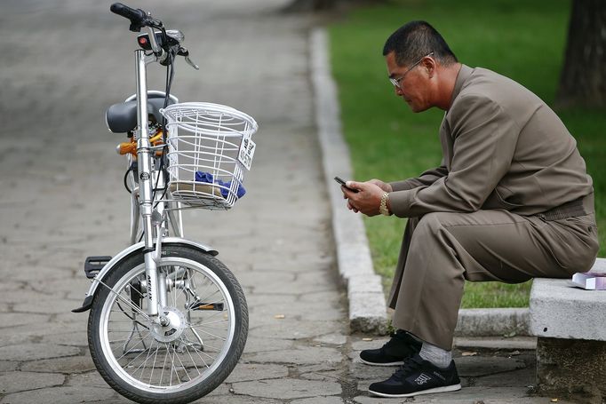 V hlavním městě je vlastnictví mobilního telefonu již téměř zcela běžná věc.