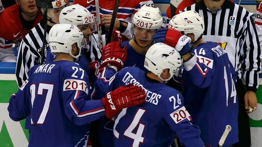 France's Antoine Roussel (C) celebrates his goal against the Czech Republic with team mates during the third period of their men's ice hockey World Championship Group A g
