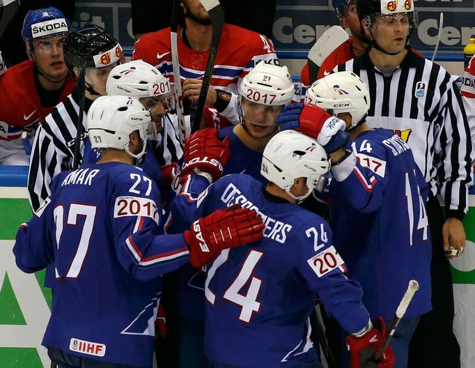 France's Antoine Roussel (C) celebrates his goal against the Czech Republic with team mates during the third period of their men's ice hockey World Championship Group A g