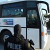Tourists who survived the attack by gunmen on Tunisia's national museum are seen in a bus in Tunis