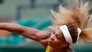 Serena Williams of the U.S. competes in a women's singles match against Garbine Muguruza of Spain at the French Open tennis tournament at the Roland Garros stadium in Par