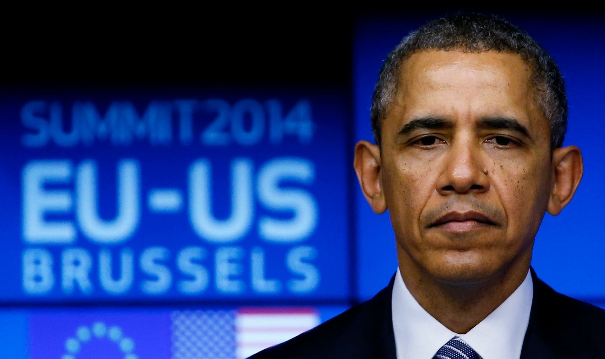 U.S. President Barack Obama looks on as he takes part in a EU-US summit in Brussels