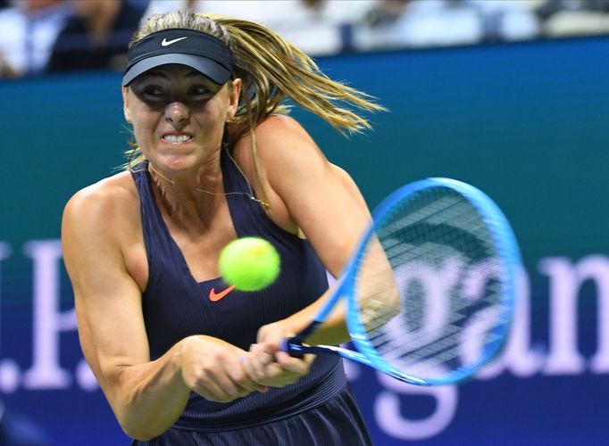 Aug 26, 2019; Flushing, NY, USA; Maria Sharapova of Russia hits to Serena Williams of the USA in the first round on day one of the 2019 U.S. Open tennis tournament at UST