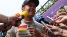 Red Bull Formula One driver Sebastian Vettel of Germany talks to the media after the second practice session of the Malaysian F1 Grand Prix at Sepang International Circui