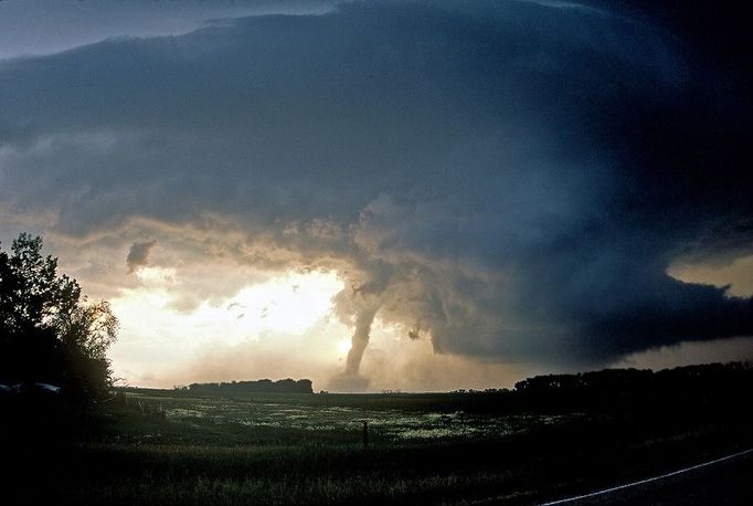 Storm Chaser Roger Hill BARNARD, SD - JUNE 23: A beautiful but dangerous F4 tornado on June 23, 2002 near Barnard, South Dakota. This tornado was the most violent tornado to ever hit northeast South Dakota. IF your bored of beach holidays and looking for something different this summer then you may want to think about a trip to America's mid-west. Storm-chasing husband and wife team Roger and Caryn Hill take British punters on the hunt of their lives following deadly and destructive tornados. Plowing their way through America's 'Tornado Alley' Roger and Caryn drive groups of up to 18 people at a time in three buses and charge up to £230 a day for a ten day tornado chase. Offering their adrenaline inducing 'Silver Lining Tours', Roger, 53 and Caryn, 50, estimate that they have taken almost 1500 people to observe raging tornado's in the American Mid-West since 2000. Taking their paying guests to within 1/4 of mile of some of the swirling 300 mph vertical wind funnels, the husband and wife team have documented awe inspiring incidents of turning twisters and powerful super-cell storms. IMAGE SUPPLIED BY ROGER HILL/BARCROFT USA UK Office, London. T +44 845 370 2233 W www.barcroftmedia.com USA Office, New York City. T +1 212 564 8159 W www.barcroftusa.com Indian Office, Delhi. T +91 114 653 2118 W www.barcroftindia.com Australasian & Pacific Rim Office, Melbourne. E info@barcroftpacific.com T +613 9510 3188 or +613 9510 0688 W www.barcroftpacific.com