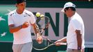 Rafael Nadal of Spain and his coach Toni Nadal attend a training session for the French Open tennis tournament at the Roland Garros stadium in Paris