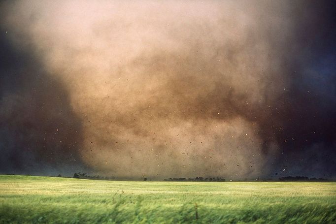 Debris flies just after this violent tornado destroyed a farmhouse near Manchester Debris flies just after this violent tornado destroyed a farmhouse near Manchester, South Dakota on June 24th, 2003. A scientific weather probe was deployed at the site of this farmhouse just 1 minute before the tornado struck and resulted in the measurem