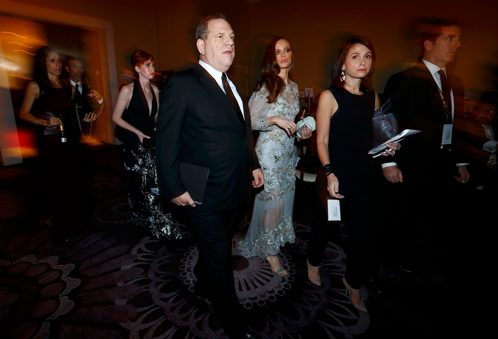 Weinstein Company chaiman Harvey Weinstein arrives with wife and fashion designer Georgina Chapman at the 72nd Golden Globe Awards in Beverly Hills