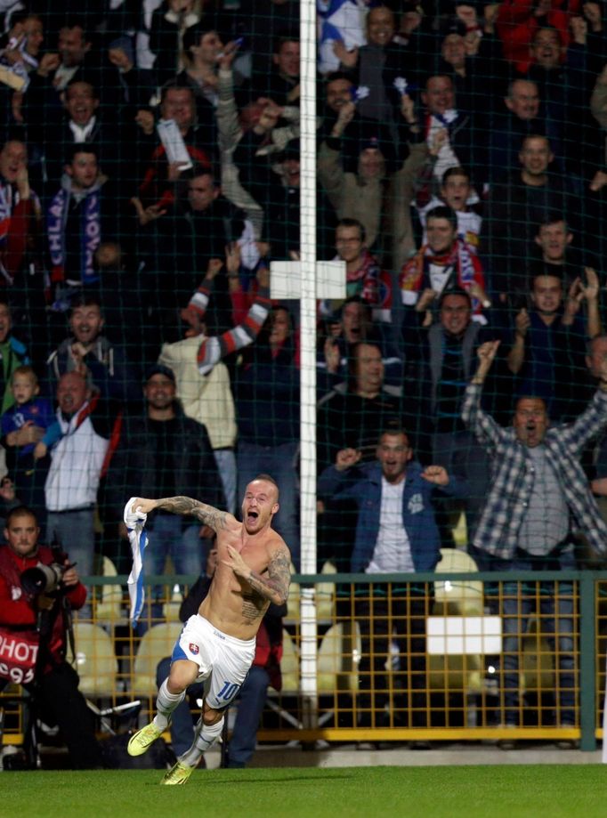 Stoch of Slovakia celebrates his goal against Spain during their Euro 2016 qualification soccer match at the MSK stadium in Zilina