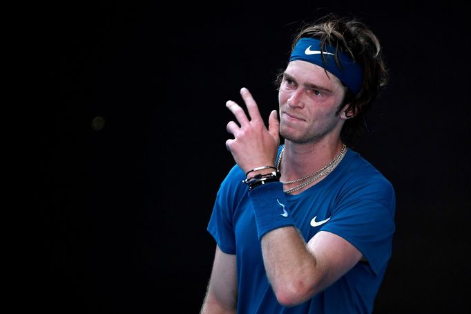 Tennis - Australian Open - Melbourne Park, Melbourne, Australia, February 17, 2021 Russia's Andrey Rublev looks dejected after losing  his quarter final match against Rus