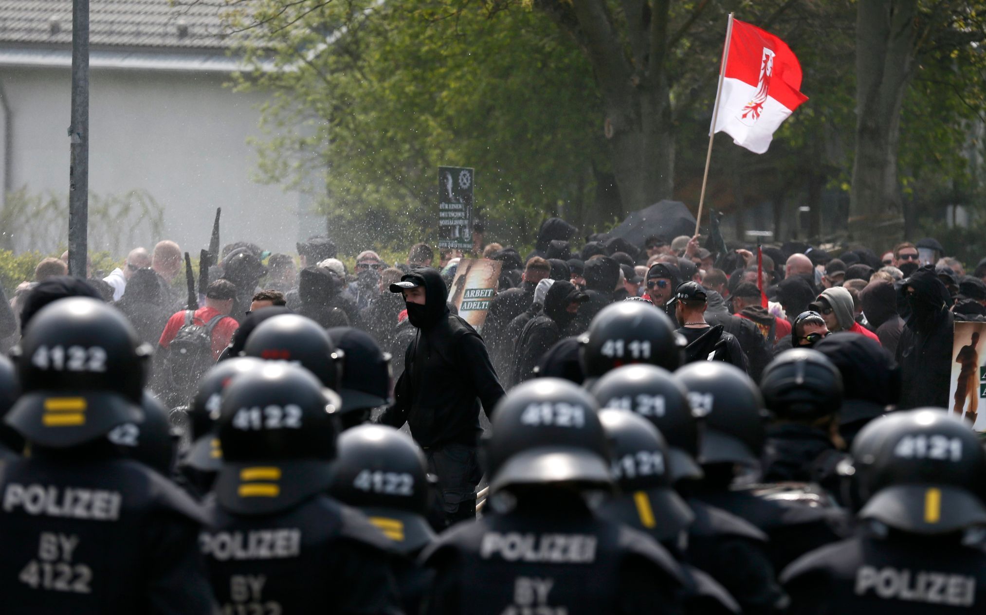 German police scuffles with right-wing protestors during a demonstration in the town of Plauen