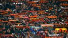 AS Roma's supporters holds their scarf during the match against Real Madrid