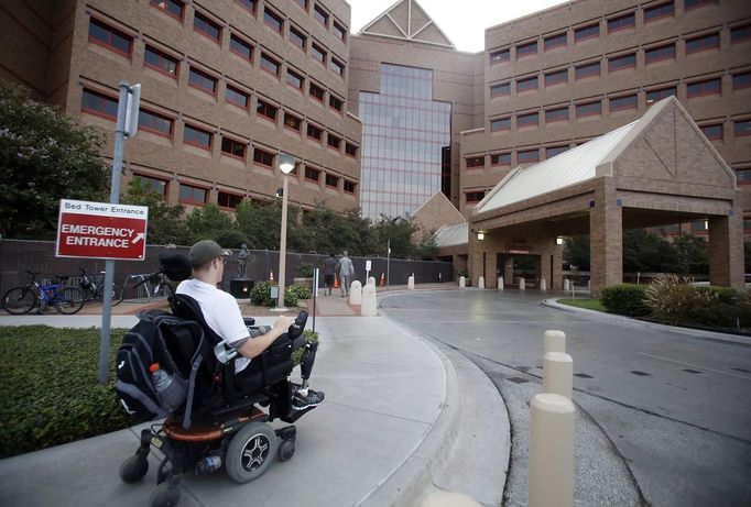 Sgt. Matt Krumwiede of the U.S. Army makes his way to Brooke Army Medical Center in San Antonio, Texas August 1, 2013. On June 12, 2012, Krumwiede was on patrol in Afghanistan when he stepped on an IED, which tore away both his legs, damaged his left arm, and ripped open his abdominal cavity. The 22-year-old has since undergone around 40 surgeries and is learning to walk with prosthetic legs. He is keen to re-join the infantry as soon as his injuries allow. U.S. troops have been in Afghanistan since 2001. Thousands of Afghan elders gathered in Kabul on November 21, 2013 at a Loya Jirga, or grand council, to debate a crucial security pact with the United States, a day after Kabul and Washington reached a draft agreement laying out the terms under which U.S. troops may stay beyond 2014. Picture taken August 1, 2013.