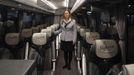 Tania Leon, a 29 year-old stewardess, poses for a picture inside a bus in Santiago de Compostela, Spain May 9, 2012. Leon studied psychology at the University of Santiago de Compostela and received a degree in 2006. She was hoping to find a job as a psychologist but has been working as a stewardess for the last two years.