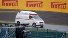 An ambulance is dispatched after the race was stopped following a crash by Marussia Formula One driver Jules Bianchi of France at the Japanese F1 Grand Prix at the Suzuka