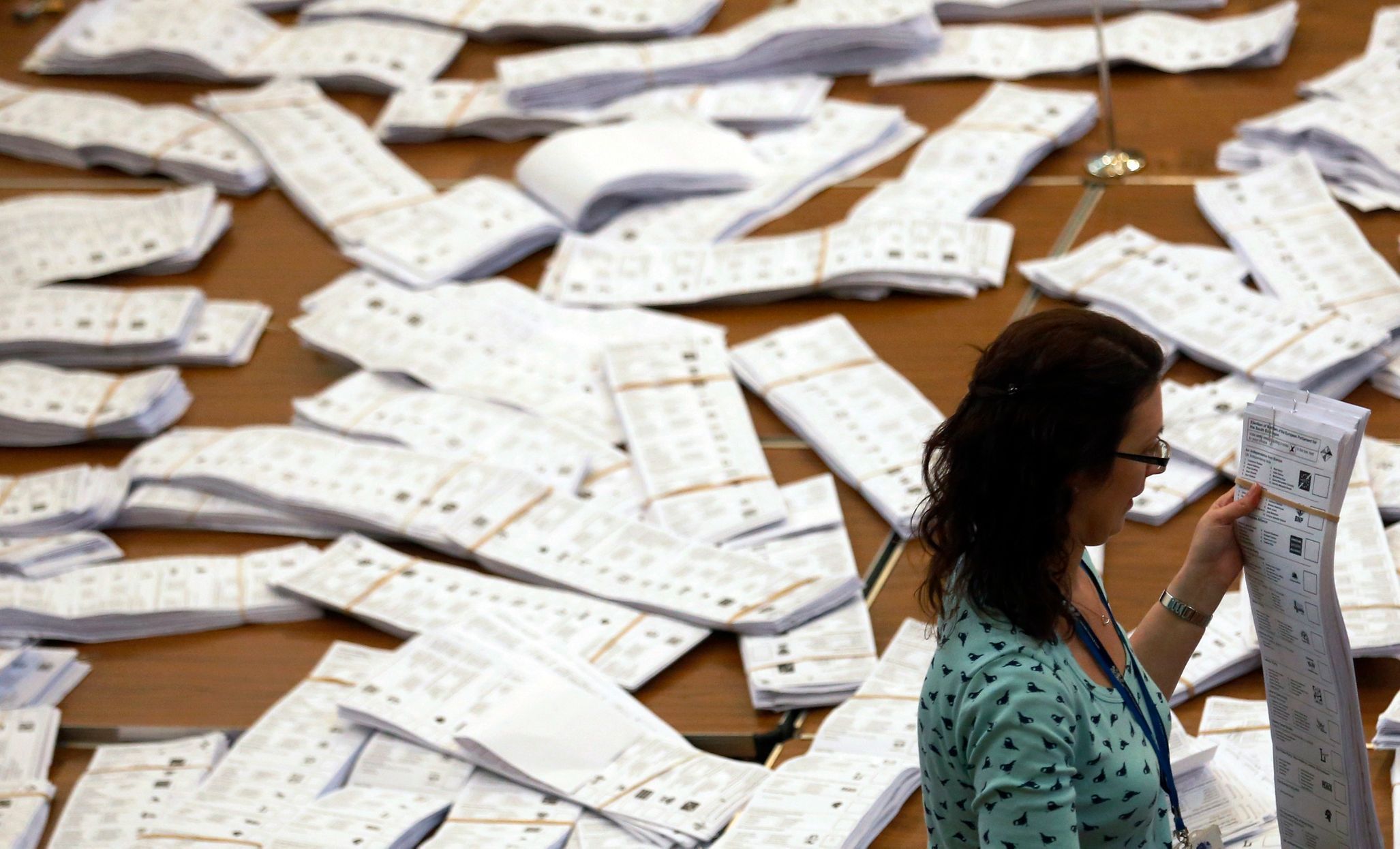 European Parliamentary election ballot papers, from the local area, are prepared to be counted, in Southampton, southern England