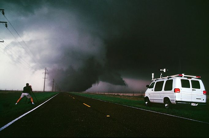 ¨Storm Chaser Filming Tornado Near Happy in Texas This tornado outside the sleepy Texas town of Happy killed two people and destroyed a church as it churned west of the town. Chasers Eric Nguyen and Dave Fick (pictured) captured the large monster from the north.