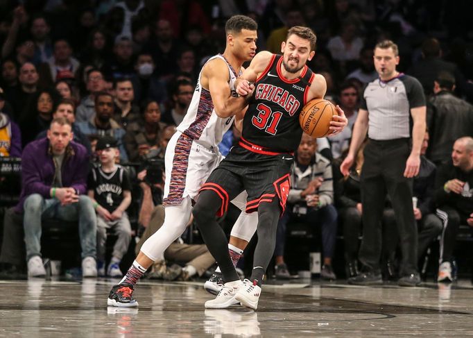 Mar 8, 2020; Brooklyn, New York, USA;  Chicago Bulls guard Tomáš Satoranský (31) is guarded by Brooklyn Nets forward Timothe Luwawu-Cabarrot (9) in the third quarter at B