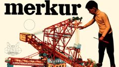 Obal stavebnice Merkur po roce 1970 legendární chlapeček s rypadlem