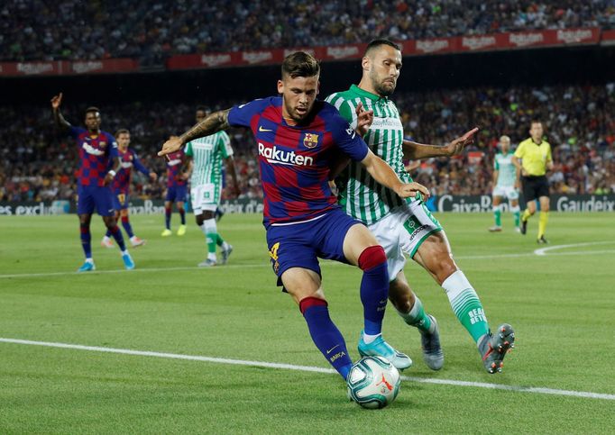 Soccer Football - La Liga Santander - FC Barcelona v Real Betis - Camp Nou, Barcelona, Spain - August 25, 2019   Barcelona's Carles Perez in action with Real Betis' Alfon