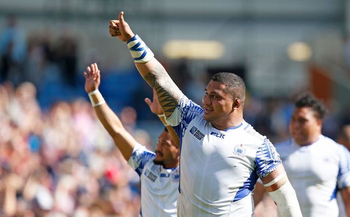 Samoa's Sakaria Taulafo (C) celebrates their victory at the end of the match Action Images via Reuters / Peter Cziborra Livepic