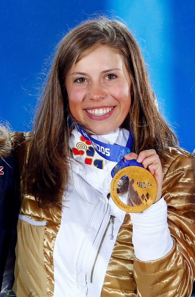 Gold medallist Eva Samkova of the Czech Republic poses during the victory ceremony for the women's snowboard cross competition at the 2014 Sochi Winter Olympics February