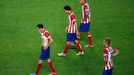 Atletico Madrid's Toby Alderweireld (R) reacts next to his team mates during their Champions League final soccer match against Real Madrid at the Luz Stadium in Lisbon Ma