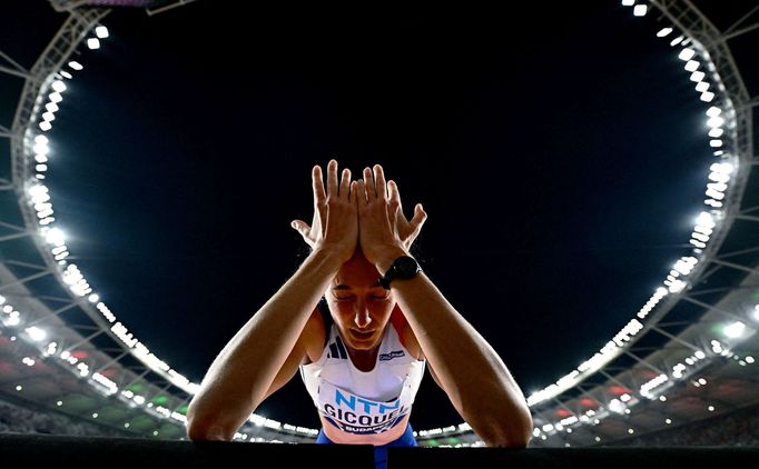 Athletics - World Athletics Championship - Women's High Jump Final - National Athletics Centre, Budapest, Hungary - August 27, 2023 France's Solene Gicquel reacts during