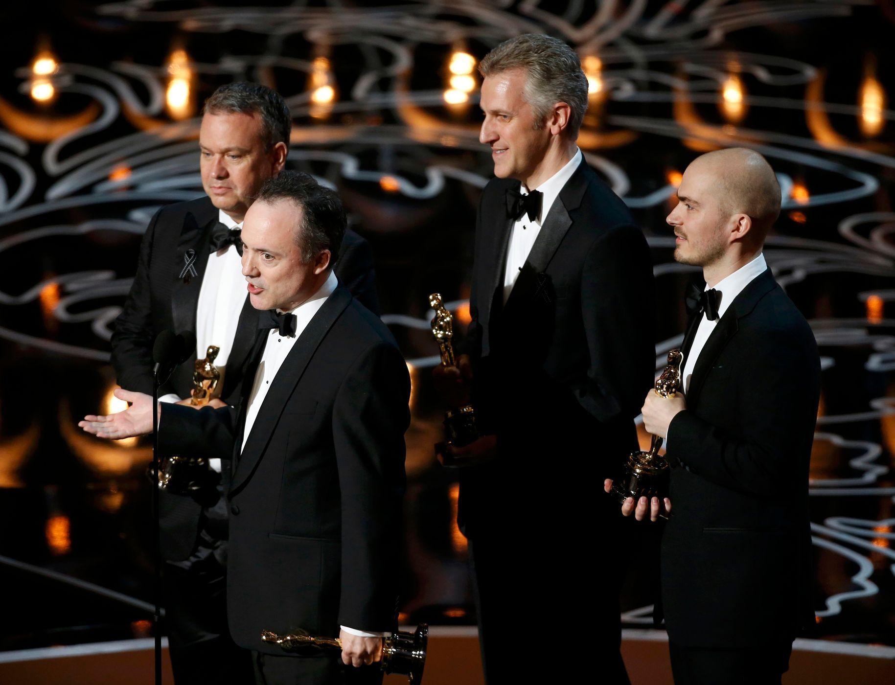 Webber, Lawrence, Shirk and Corbould accept the Oscar for visual effects for &quot;Gravity&quot; at the 86th Academy Awards in Hollywood