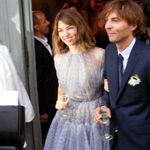 Sofia Coppola a Thomas Mars v roce 2011. Sofia zvolila krásné fialové šaty nad kolena.